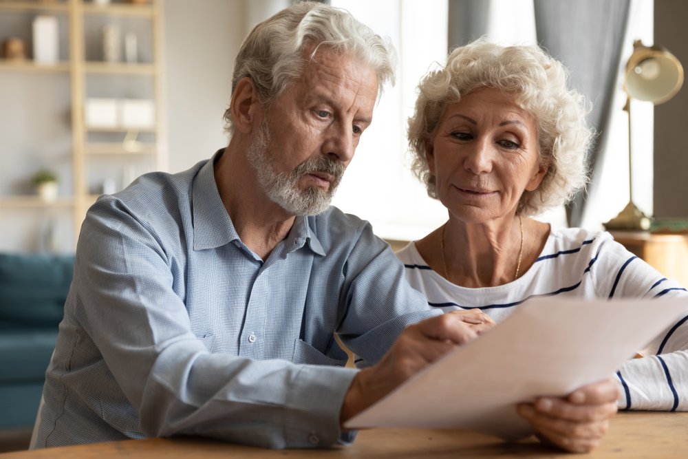 senior couple paperwork